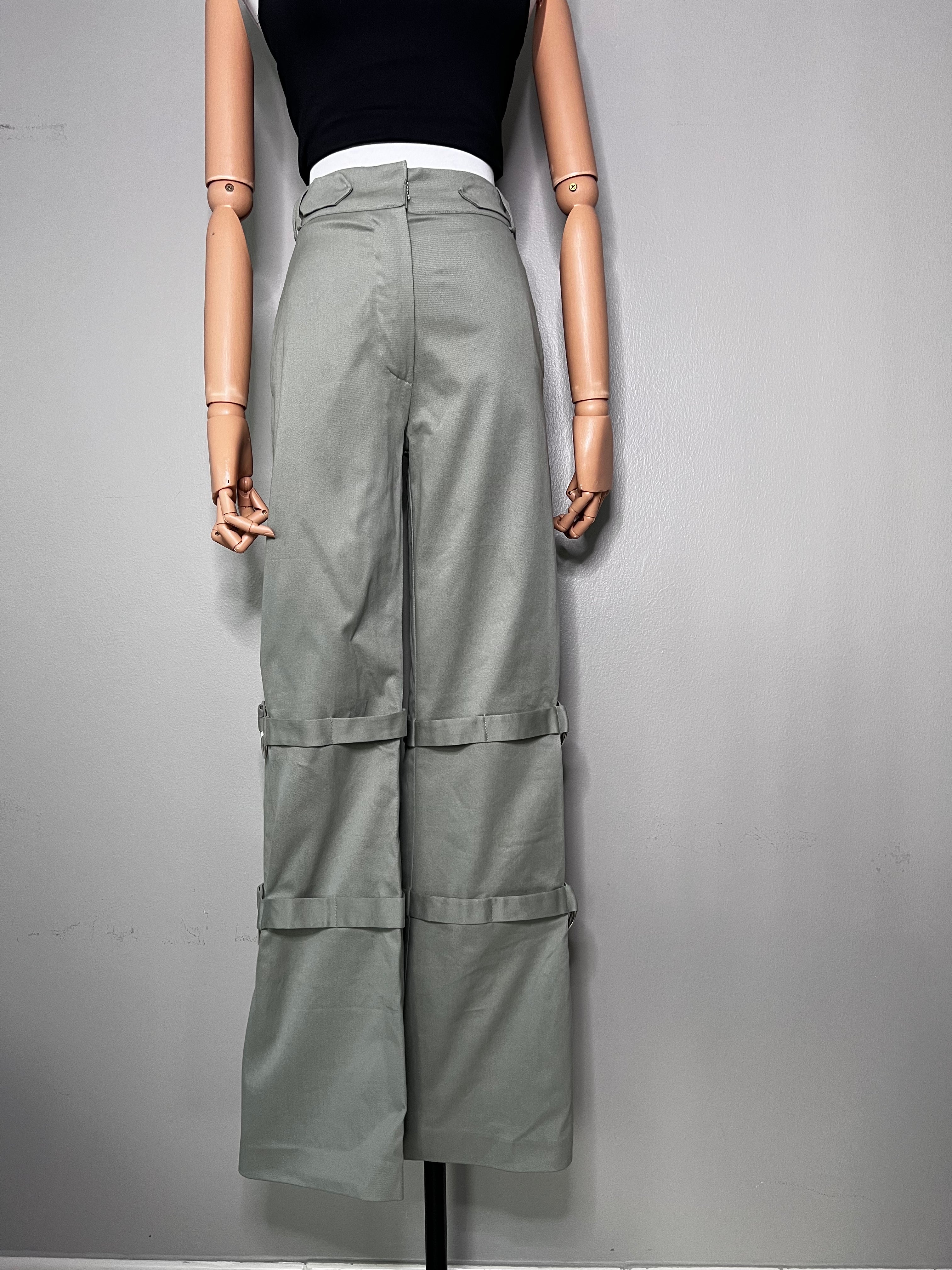 Brand new long green flared cargo pants with belt-like features all the way down the leg. - MEIDIEM