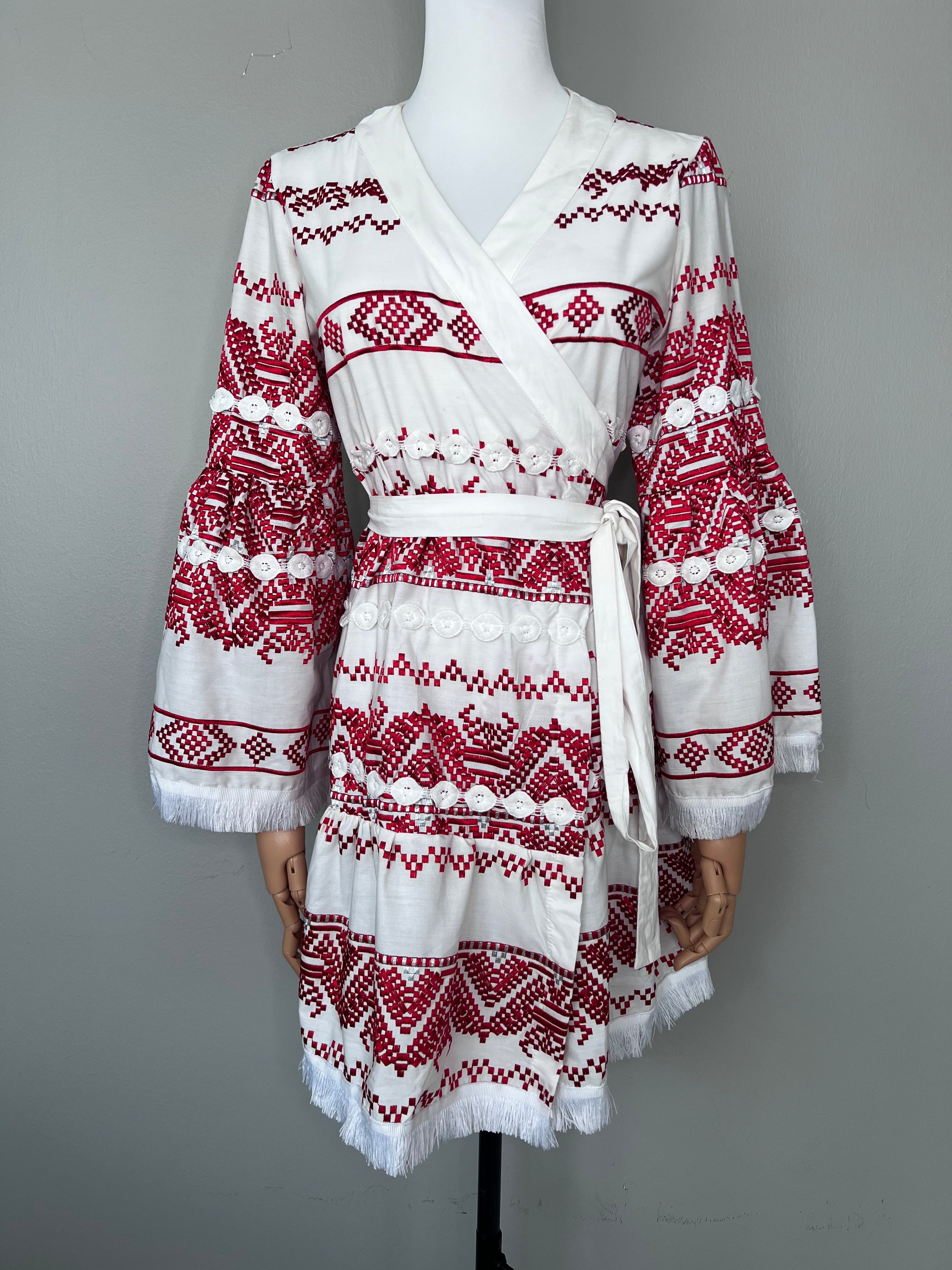 White wrap up dress with red stitching