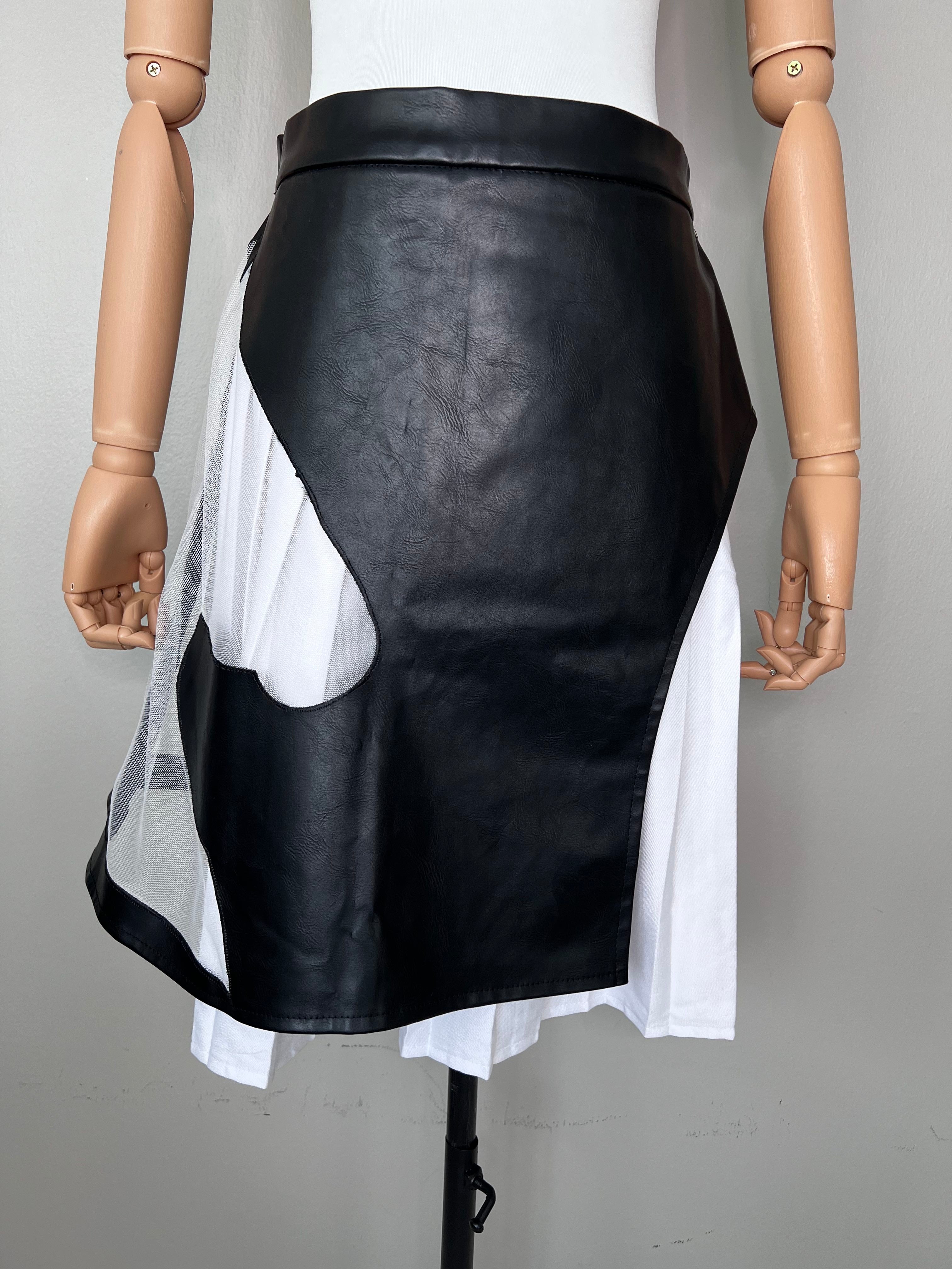 Short pleated white underskirt with leather skirt that has a horse cut out on the side. - MAMZI.