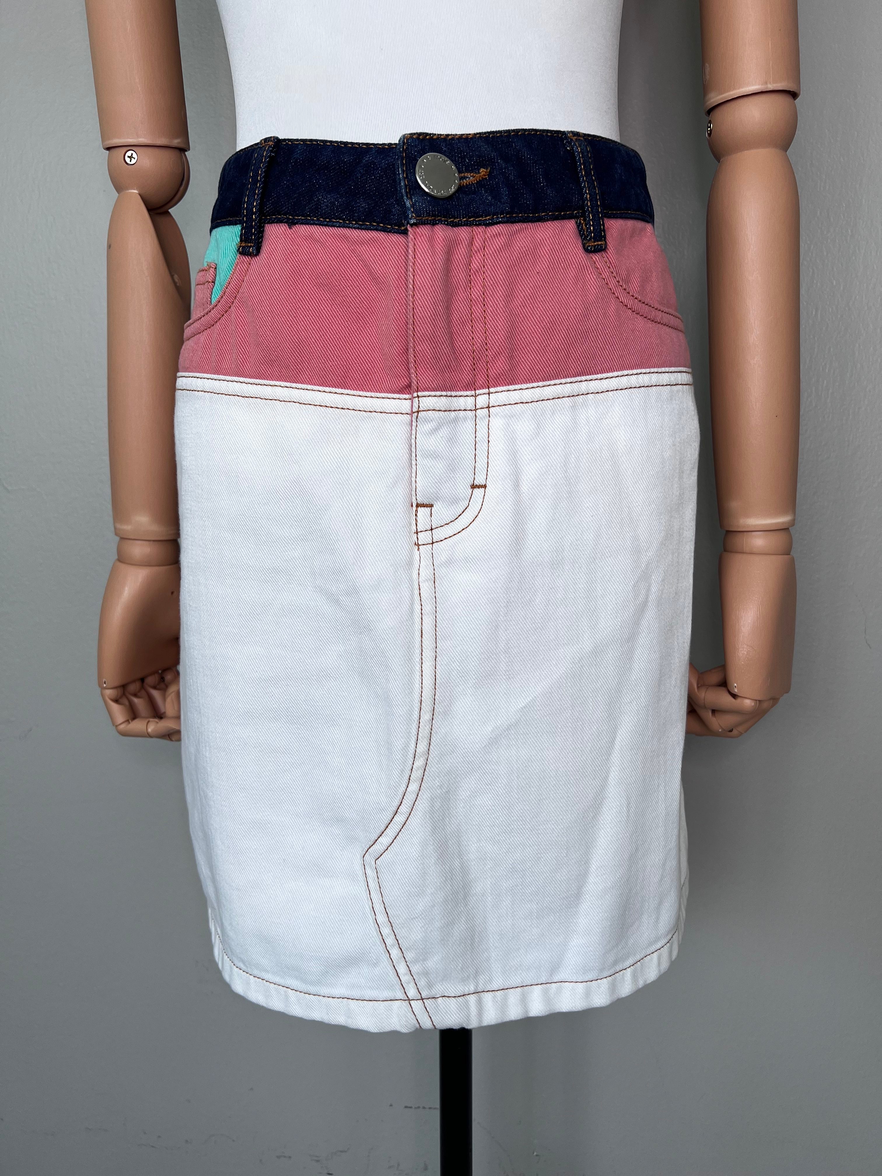Mini multicolored denim skirt with blue denim waistband, one green pocket, pink denim across the top part, and blue denim on the back pocket. - MAJE