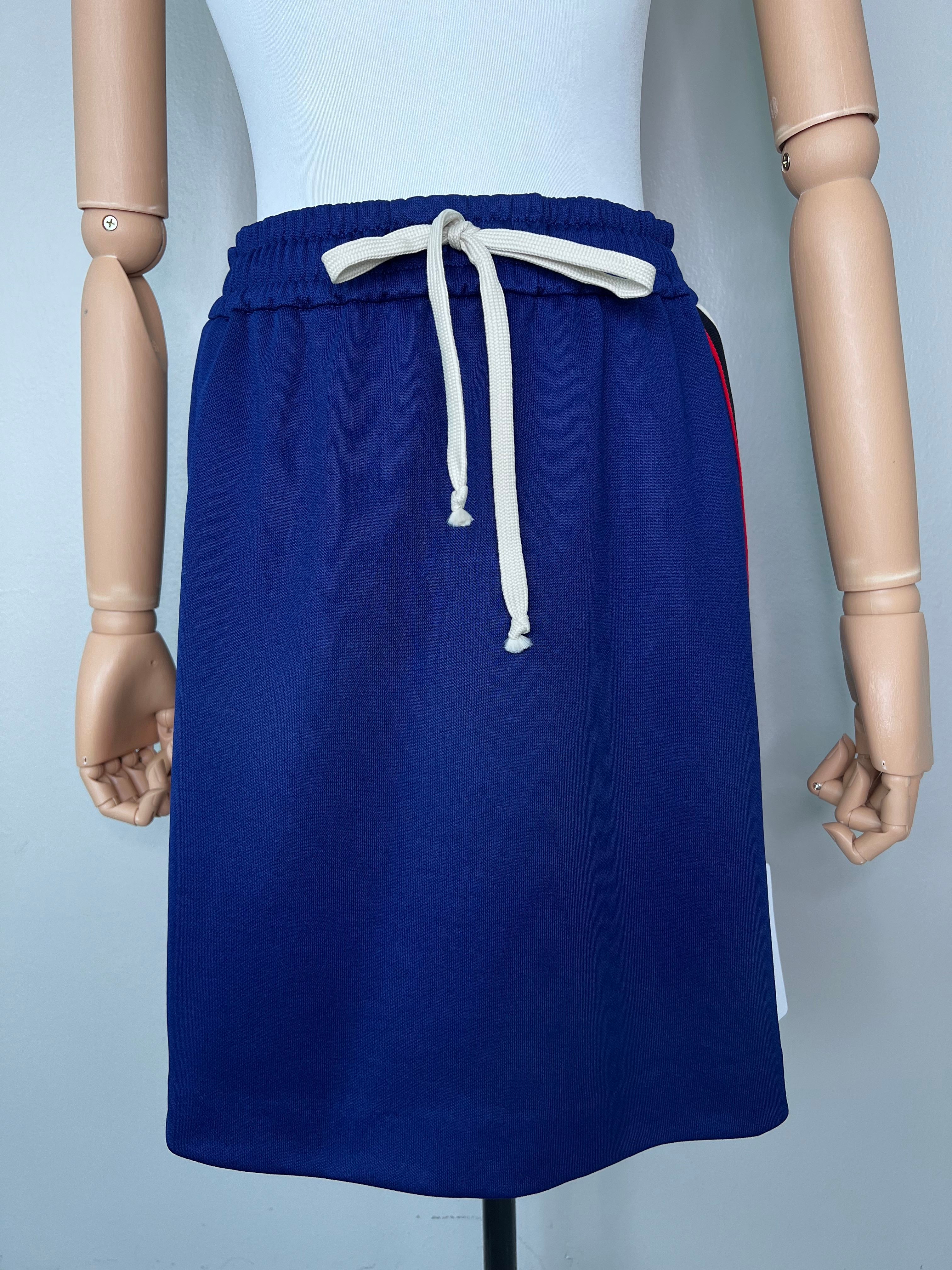 Brand new! short straight cut guccci skirt with GG logo stripes on sides.
