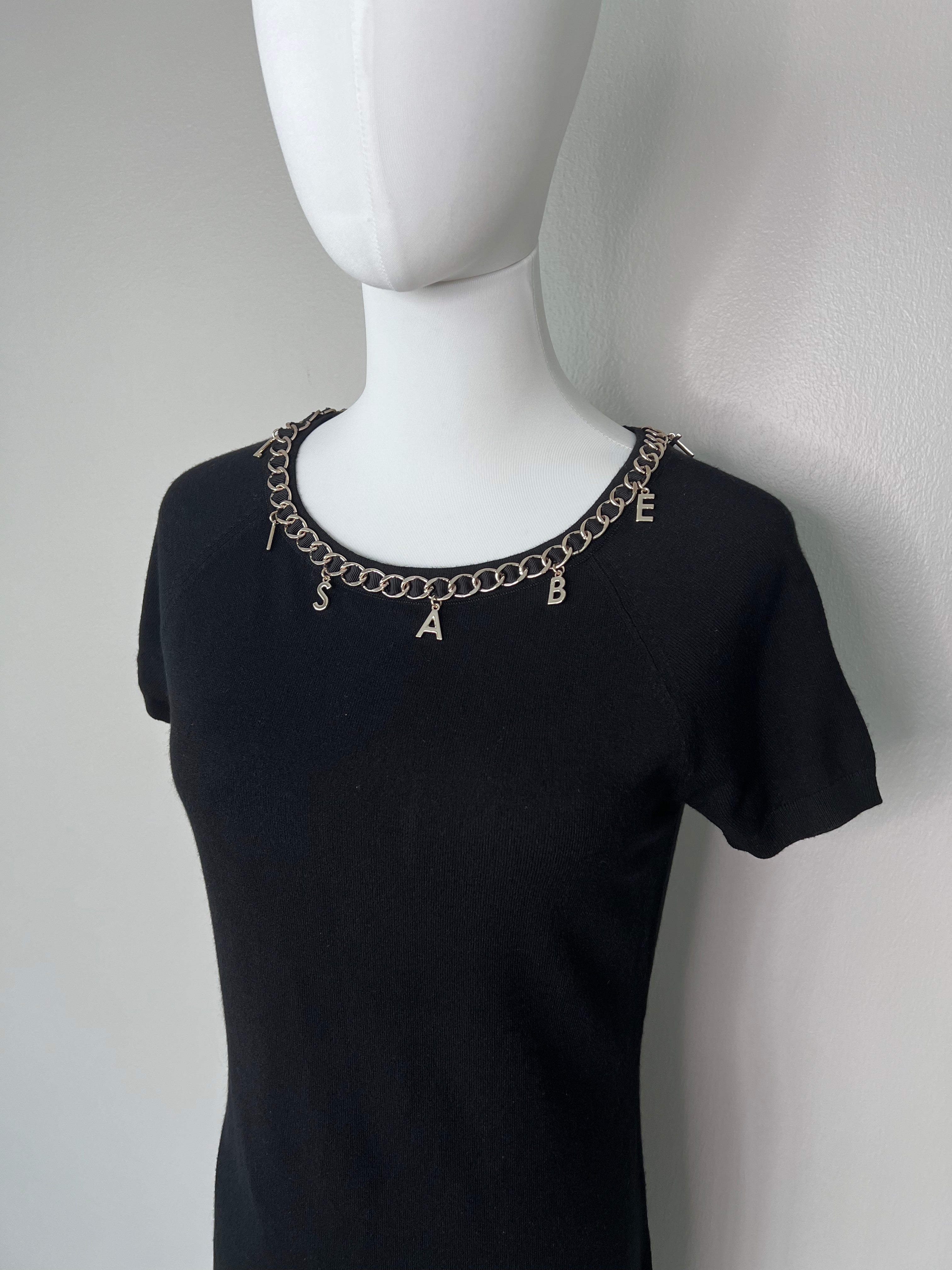 Brand new short black knitted t-shirt dress with gold hardware around the neckline. - ELISABETTA FRANCHI