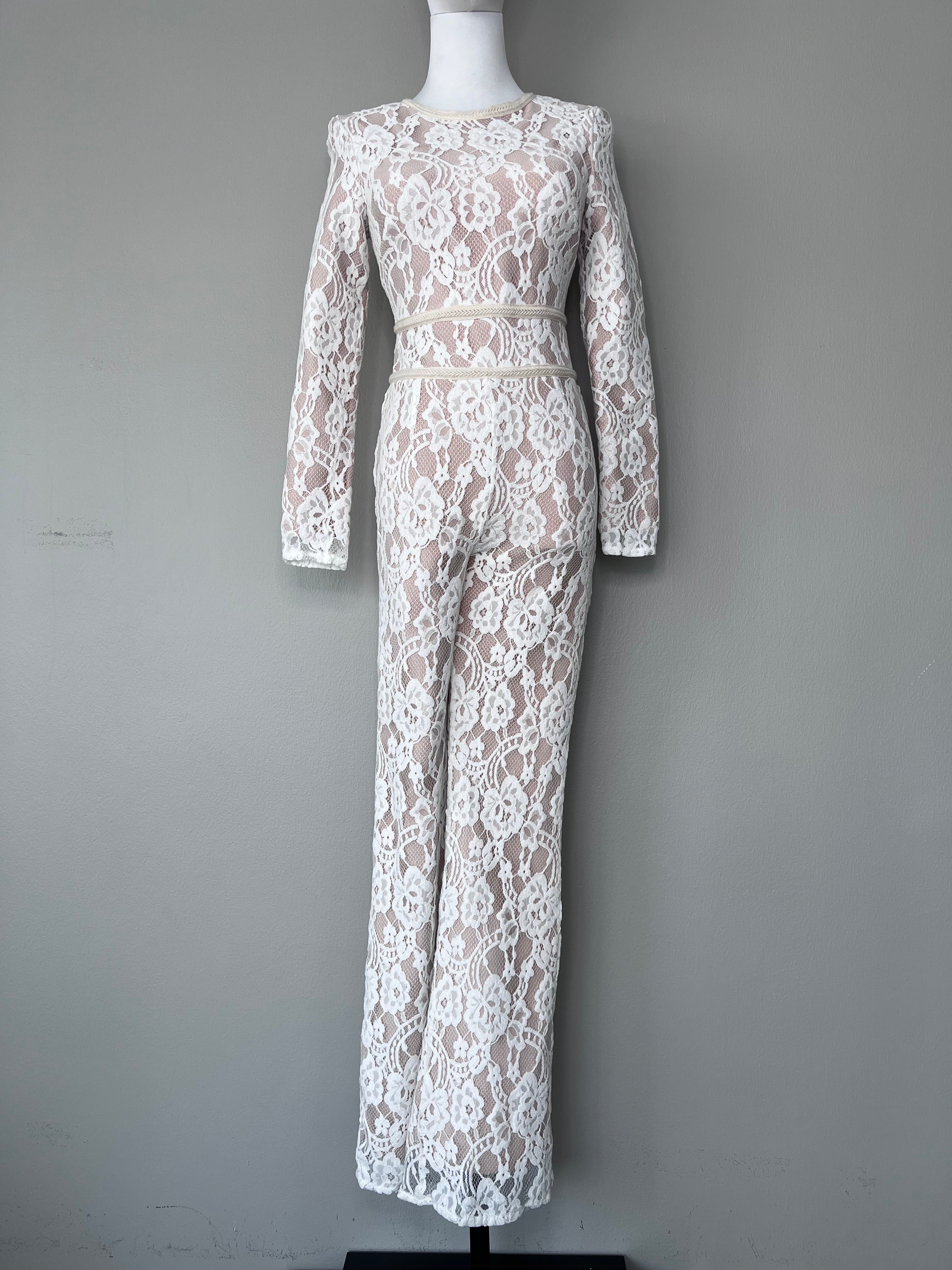 Nude jumpsuit with white lace patterns - 