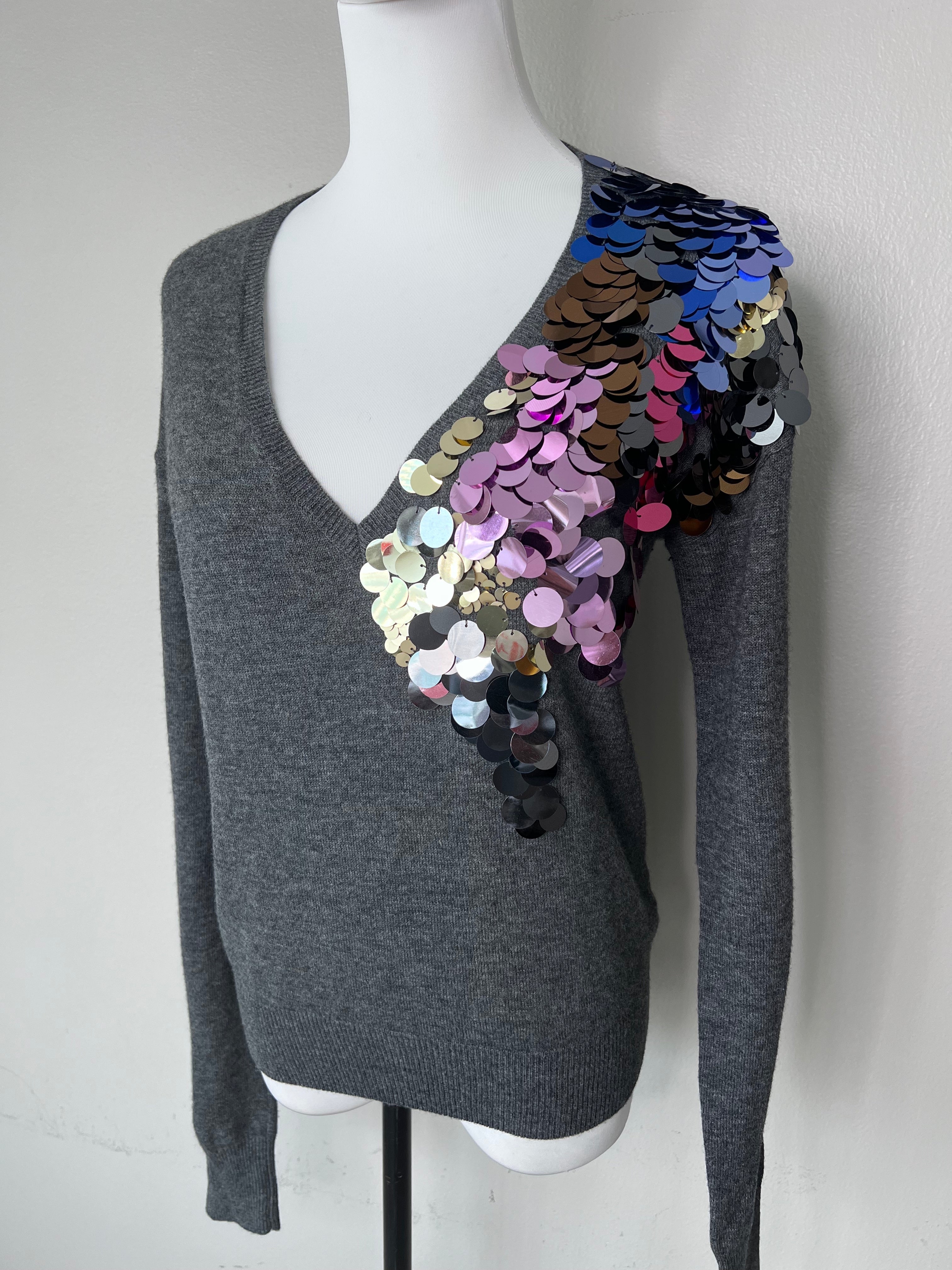 Grey wool sweater with deep v neckline and multicolored sequenced detail at the upper left side.-LIU.JO