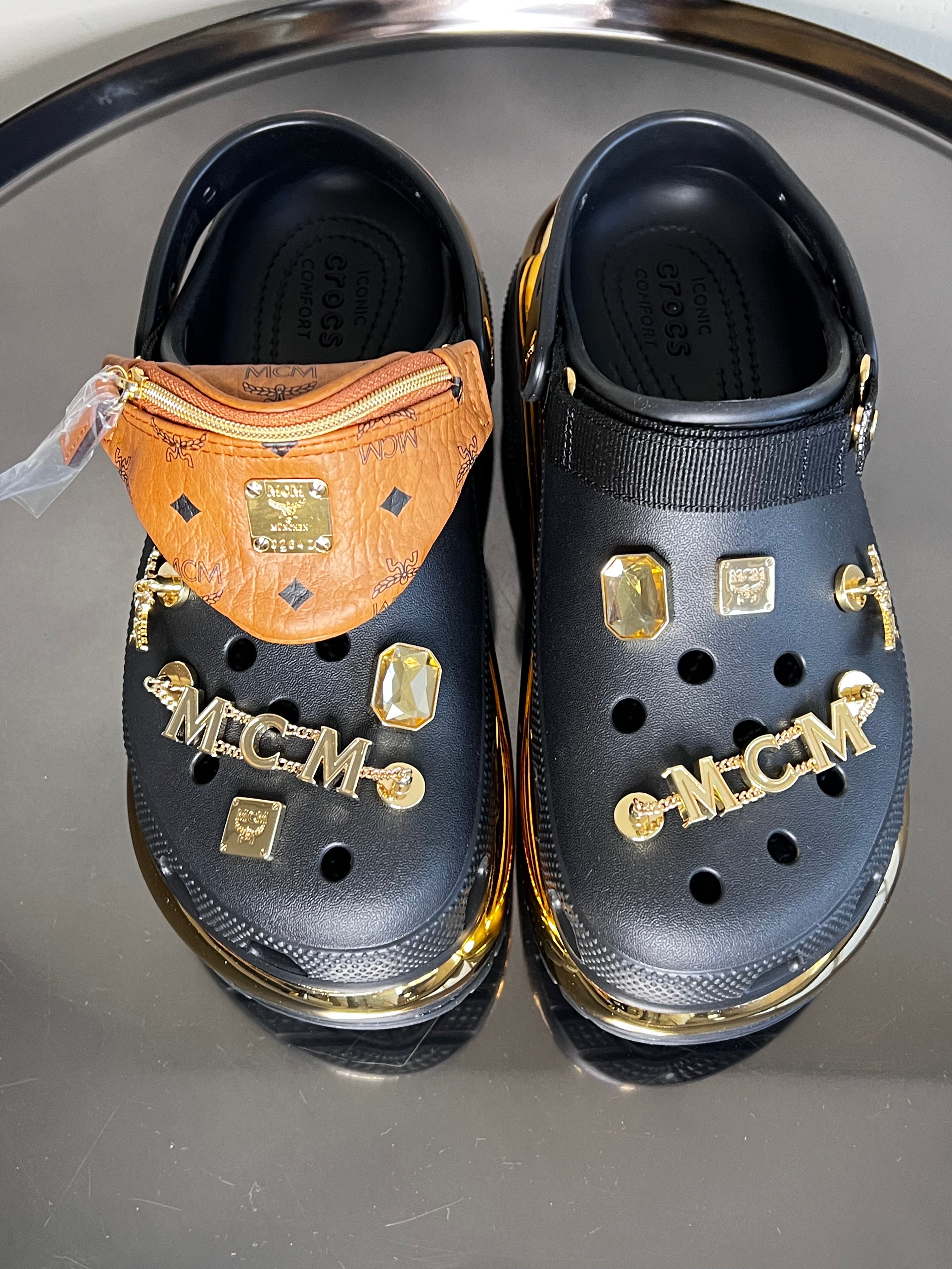 Black with gold Mega crush clog with belt bag bling - MCM x Crocs