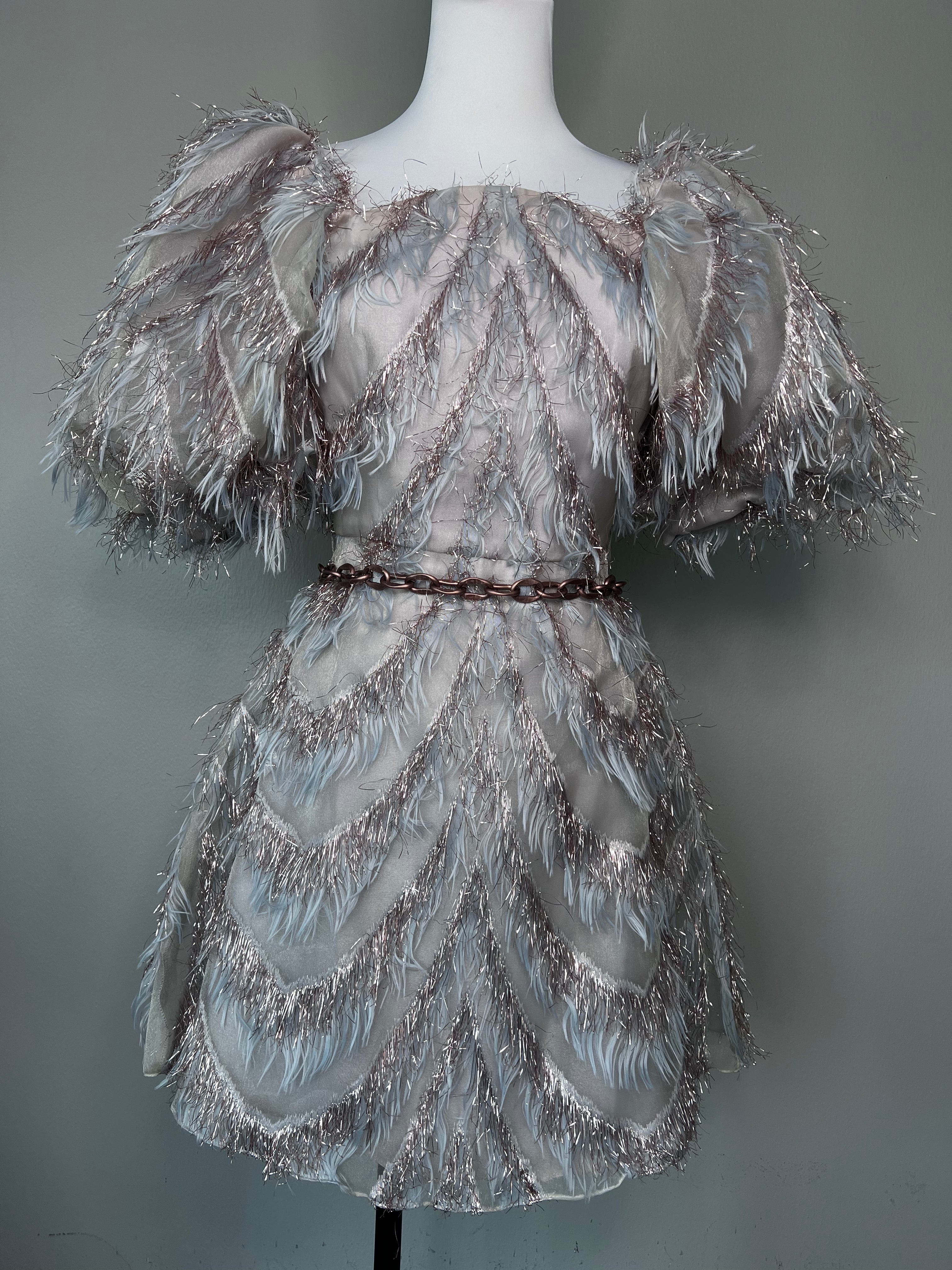 Multicolour off-the-shoulder puffy dress with rosegold and blue feathers and chain at waistband. -CECE CHIC