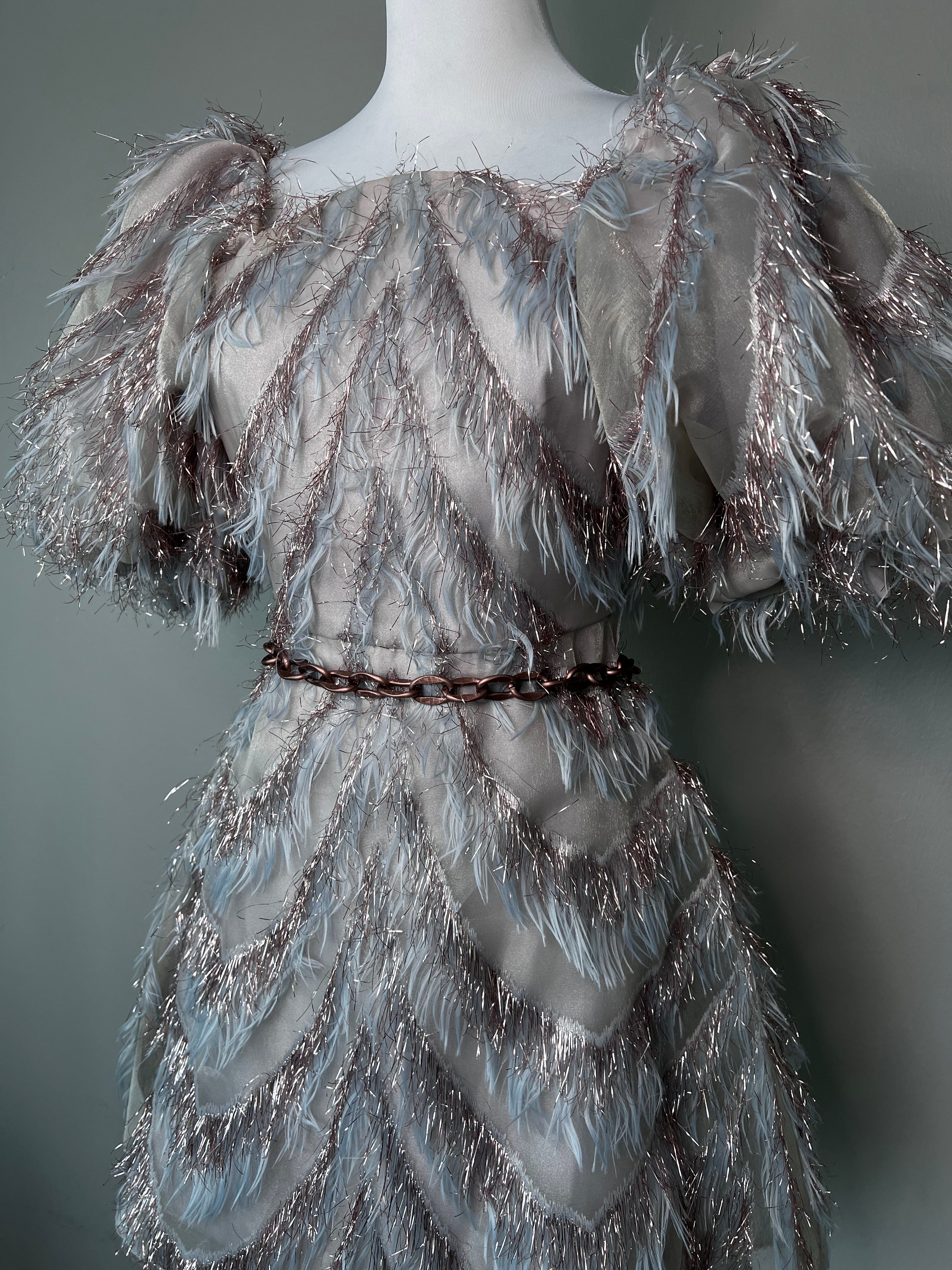 Multicolour off-the-shoulder puffy dress with rosegold and blue feathers and chain at waistband. -CECE CHIC