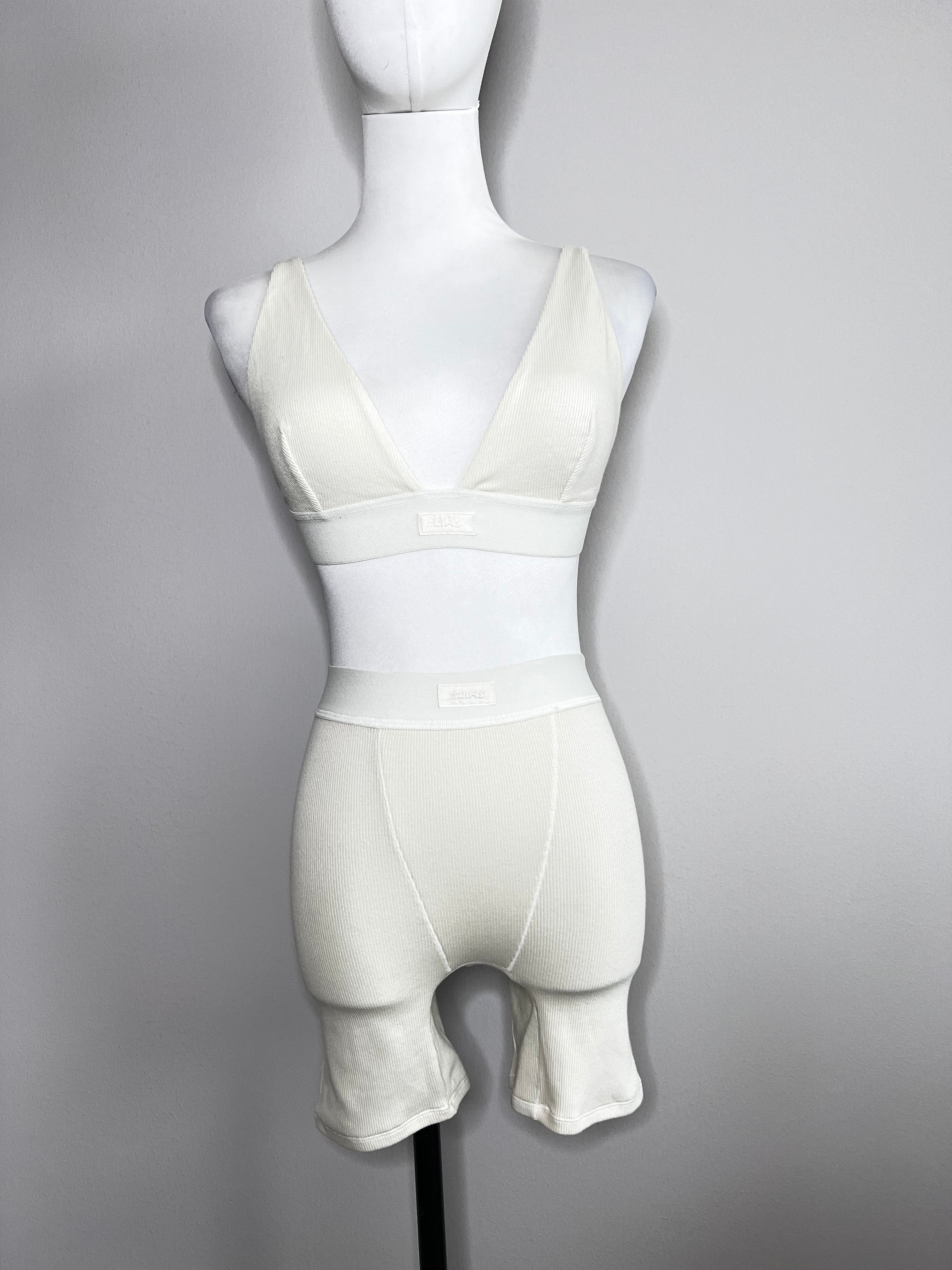 A set of cotton rib boxer shade of bone with non paded plunge bralette - SKIMS
