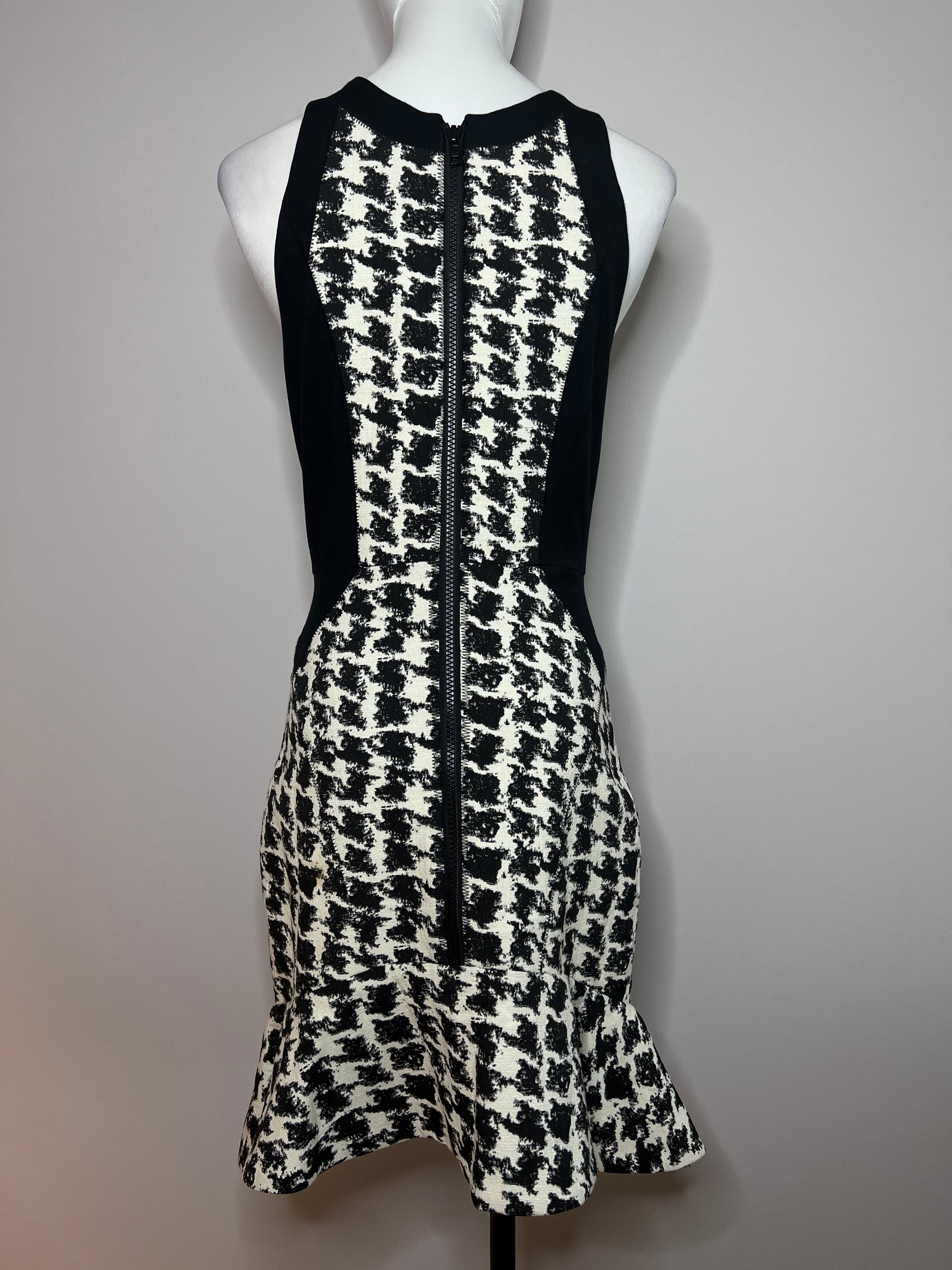 Aline halter top midi dress with a rough houndstooth pattern in the center and zipper going down the middle. - PARKER