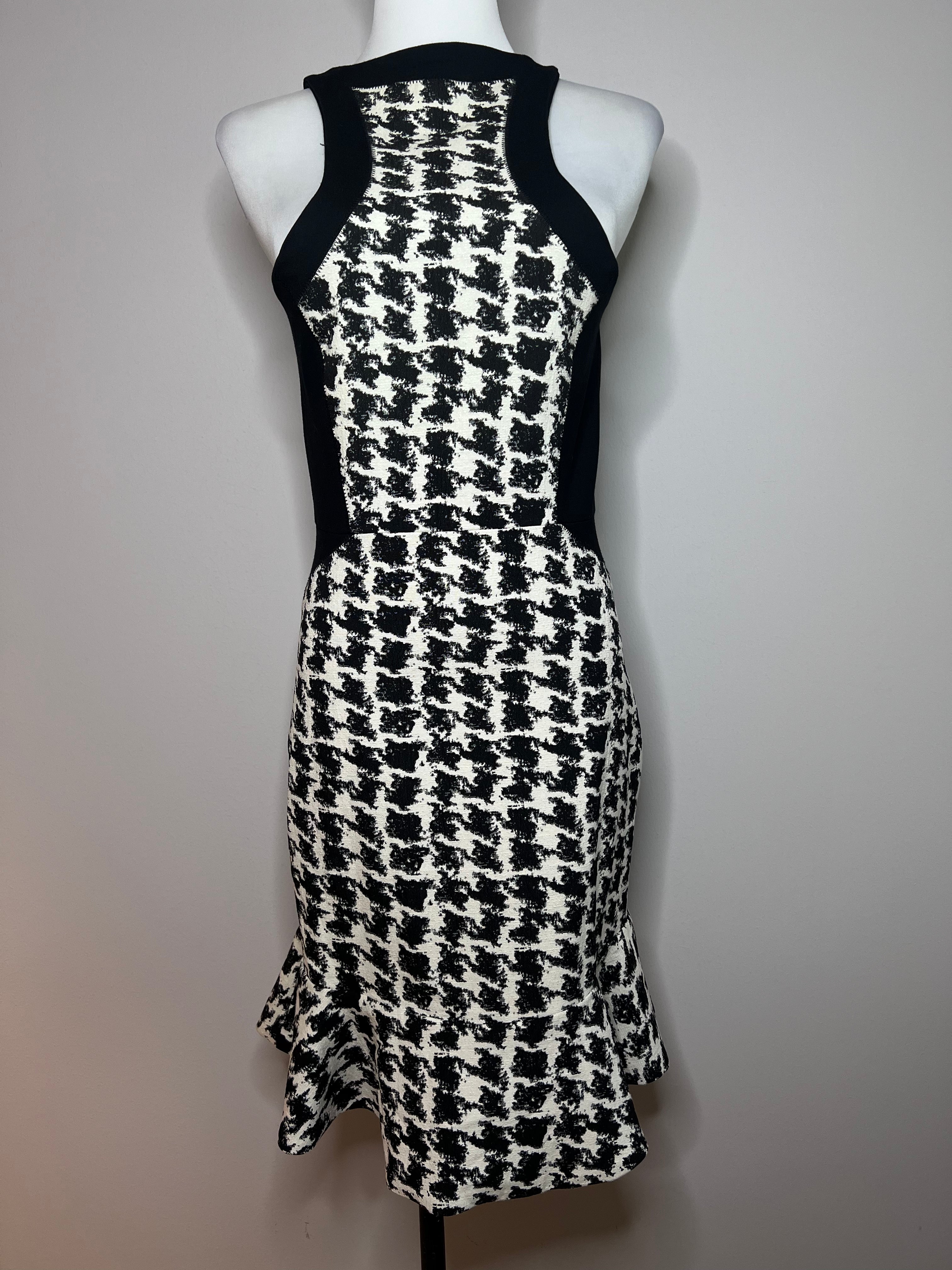 Aline halter top midi dress with a rough houndstooth pattern in the center and zipper going down the middle. - PARKER