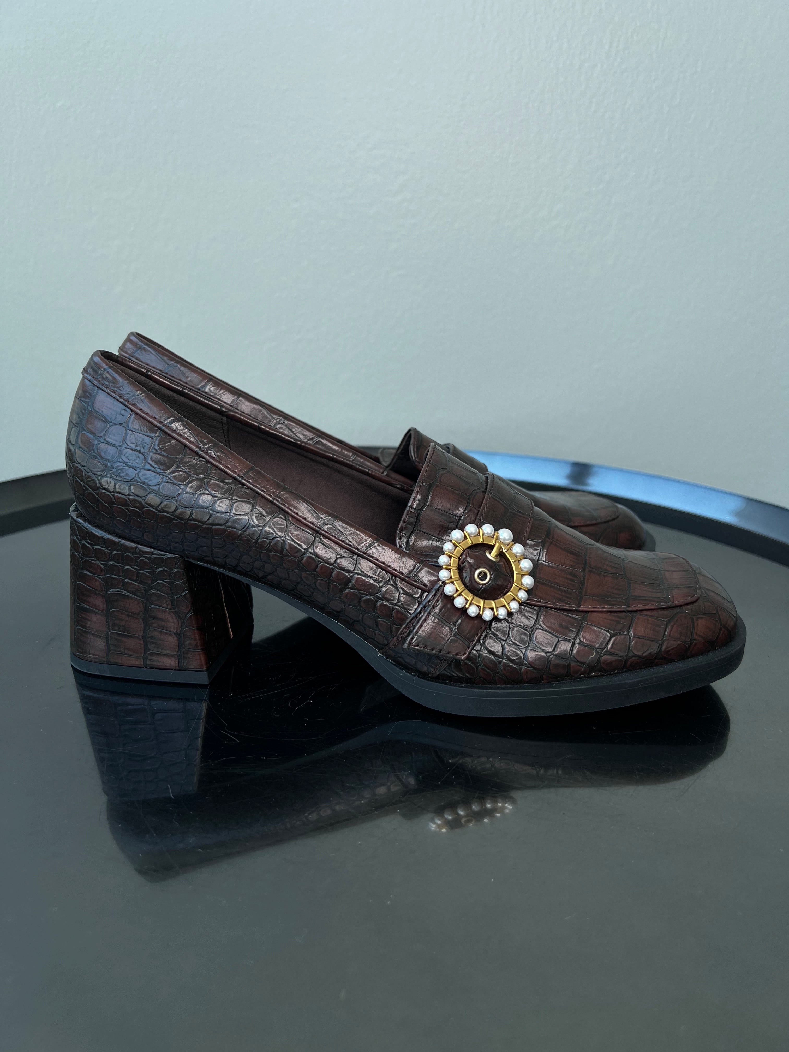 Brown leather heeled loafers with pendant. - CHARLES AND KEITH