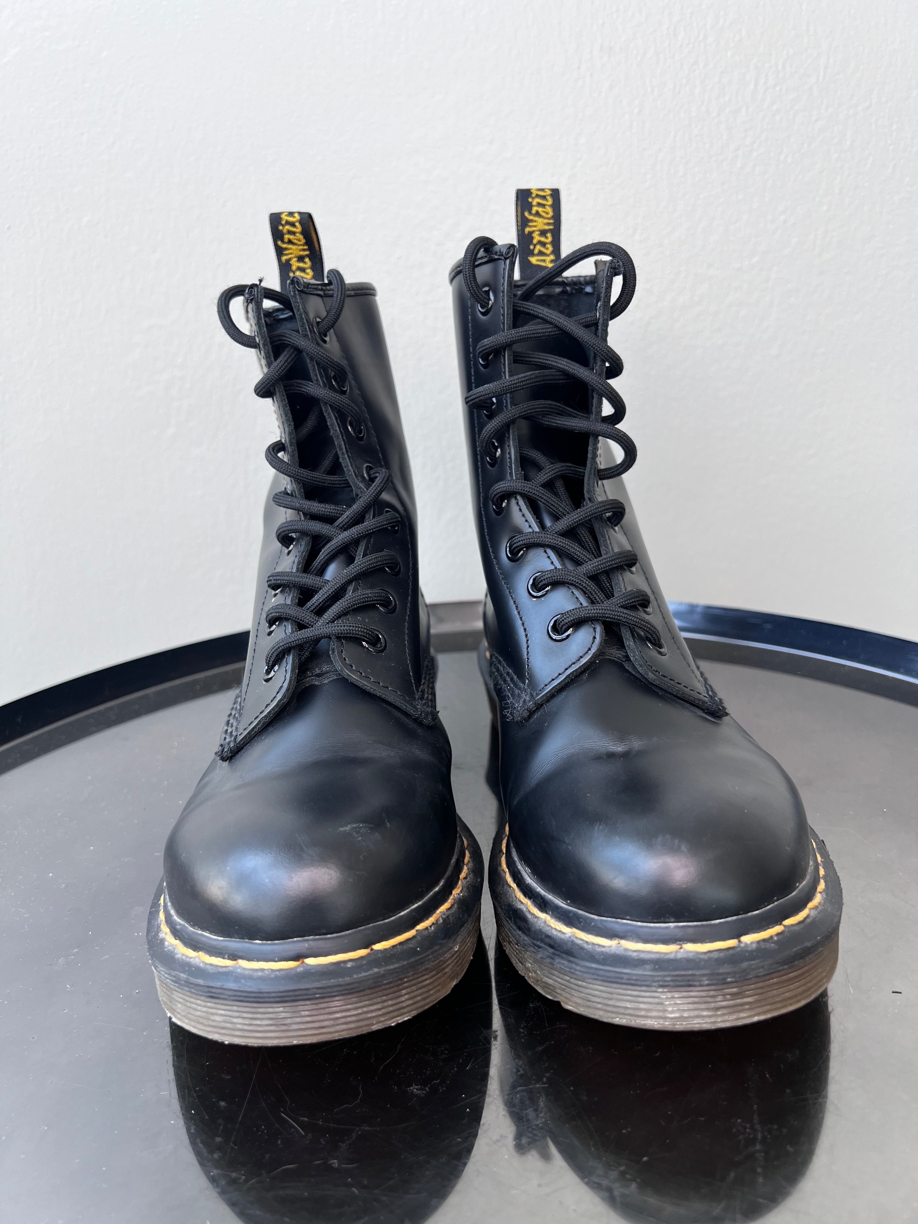 Black boots with yellow stitching- DOCMARTENS