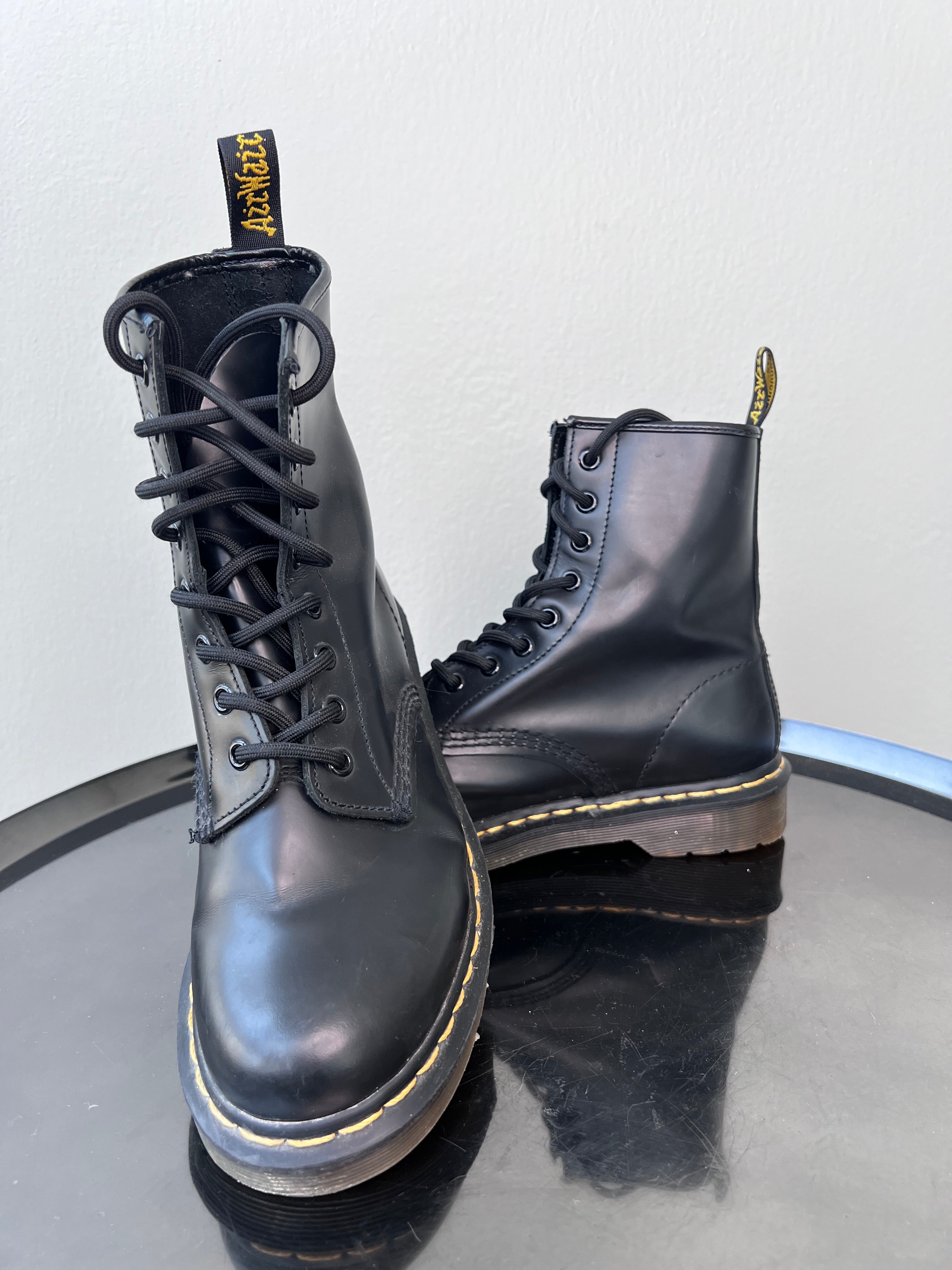 Black boots with yellow stitching- DOCMARTENS