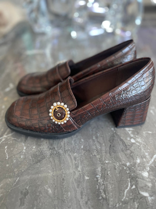 Brown leather heeled loafers with pendant. - CHARLES AND KEITH